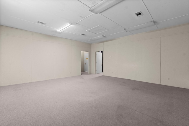 empty room featuring carpet floors