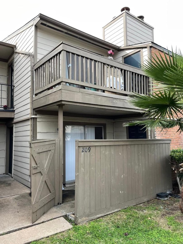 exterior space with a balcony