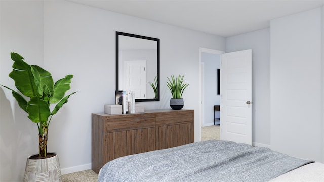 bedroom featuring light colored carpet