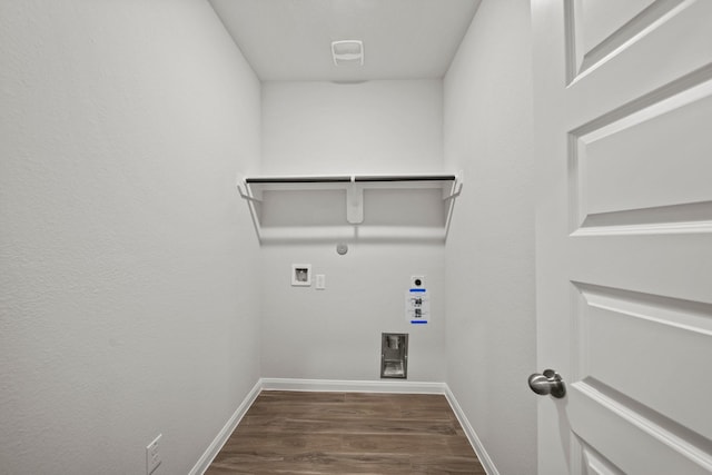 laundry room featuring dark wood-style floors, washer hookup, gas dryer hookup, laundry area, and baseboards