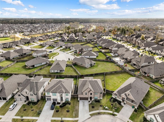 birds eye view of property with a residential view