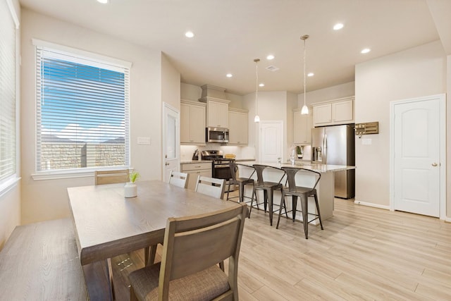 dining room featuring light hardwood / wood-style flooring