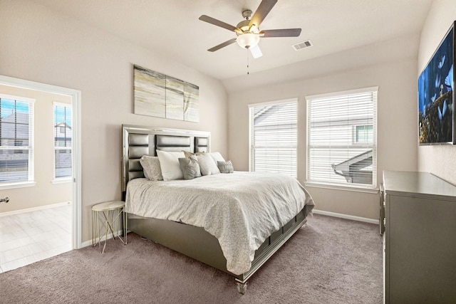 bedroom featuring ceiling fan and carpet