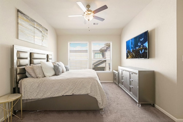 bedroom with ceiling fan, light carpet, and lofted ceiling