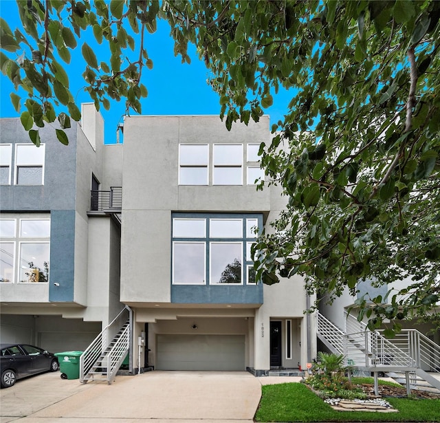 modern home featuring a garage