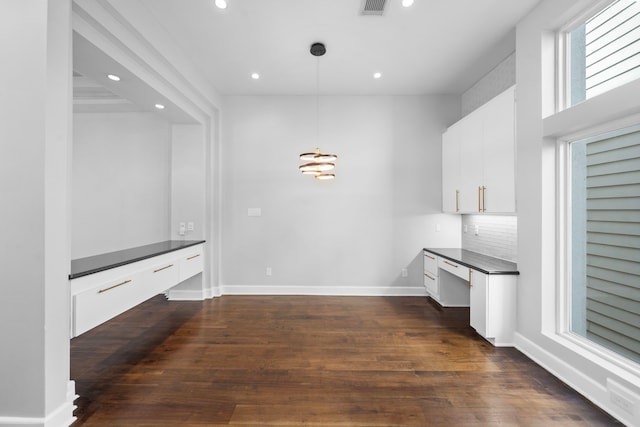 interior space featuring dark hardwood / wood-style flooring