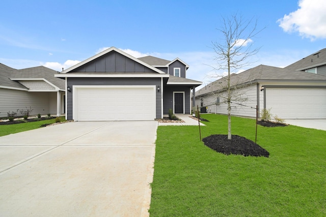 view of front of property with an attached garage, a front lawn, board and batten siding, and concrete driveway