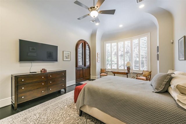 bedroom featuring ceiling fan and dark hardwood / wood-style floors