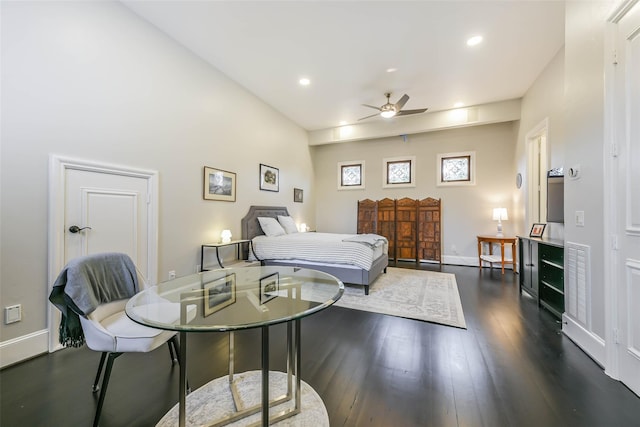 bedroom with ceiling fan and dark hardwood / wood-style flooring