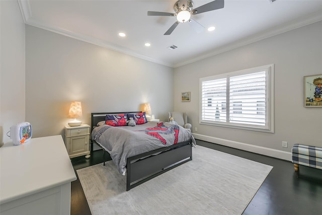 bedroom featuring ceiling fan, dark hardwood / wood-style floors, and ornamental molding