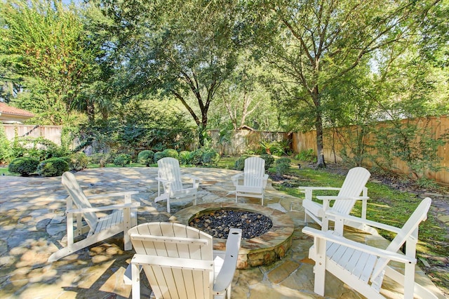 view of patio with a fire pit