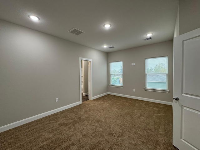 view of carpeted spare room