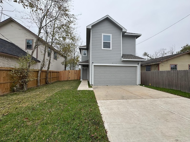 back of property with a garage and a lawn