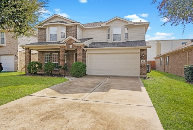 view of front of home with a front yard, central AC, and a garage