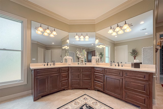 bathroom featuring tile patterned floors, vanity, ornamental molding, and a chandelier