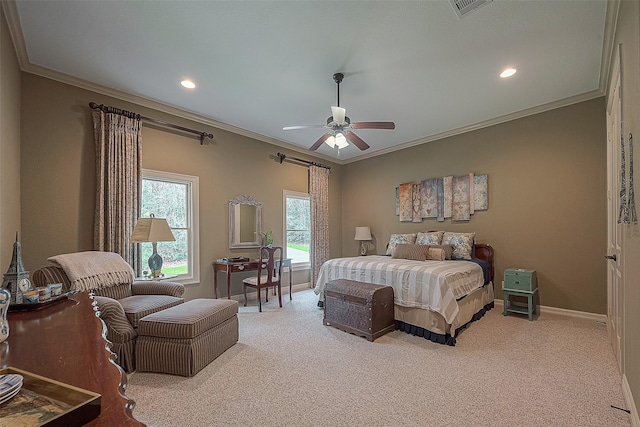 carpeted bedroom with ceiling fan and ornamental molding