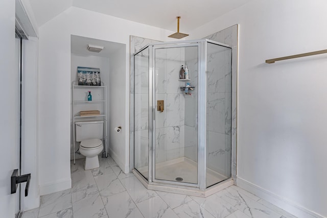 bathroom with toilet and walk in shower