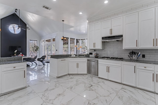 kitchen featuring kitchen peninsula, decorative backsplash, stainless steel appliances, decorative light fixtures, and white cabinets