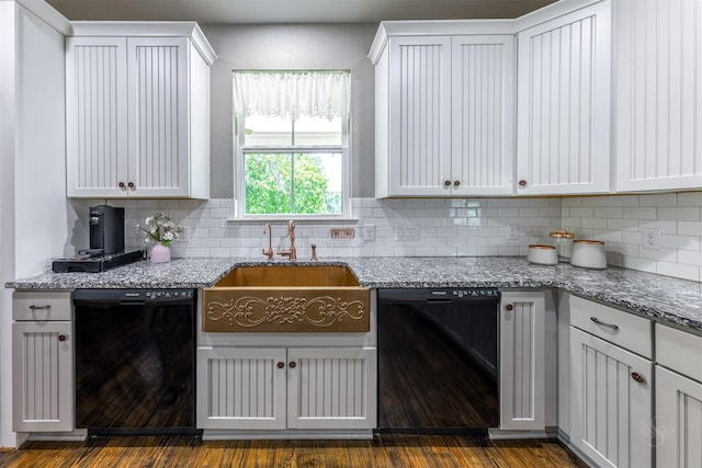 kitchen featuring white cabinetry, sink, dark wood-type flooring, and black dishwasher