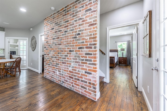 foyer with dark hardwood / wood-style flooring