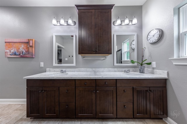 bathroom featuring tile patterned floors and vanity