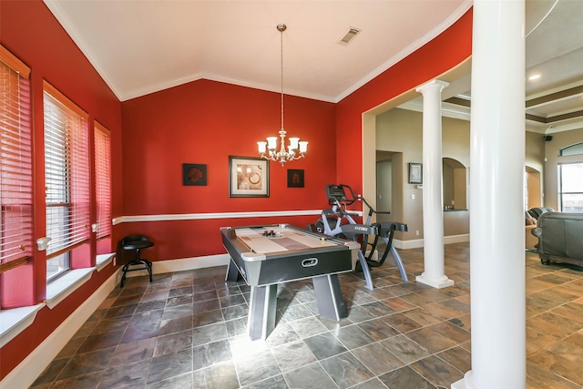 playroom with lofted ceiling, crown molding, plenty of natural light, and a notable chandelier