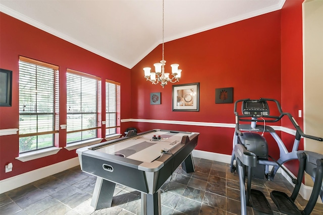 game room featuring a chandelier, a healthy amount of sunlight, crown molding, and lofted ceiling