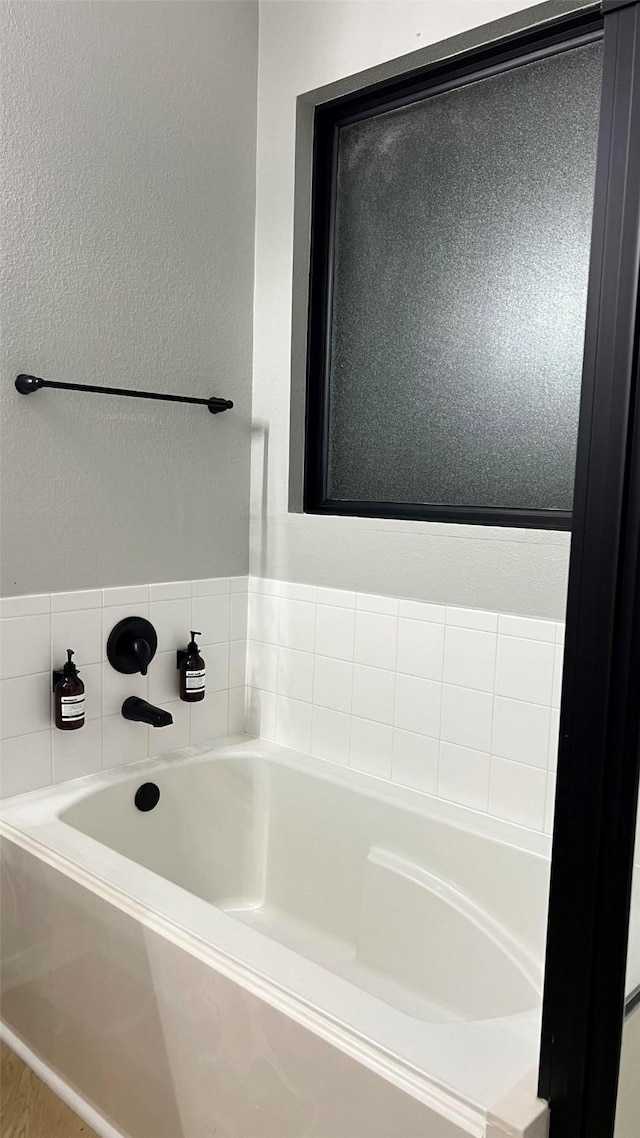 bathroom featuring a bathtub