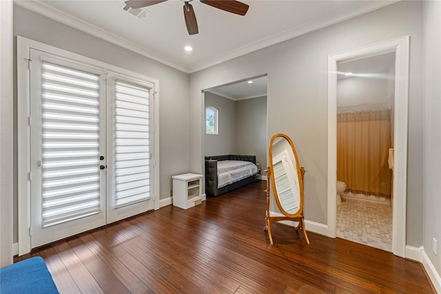 bedroom with dark wood-type flooring, ensuite bath, access to outside, ornamental molding, and ceiling fan