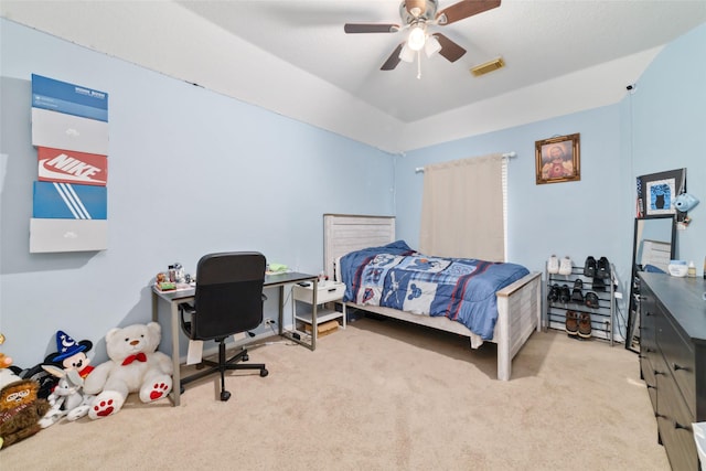 bedroom with light carpet and ceiling fan