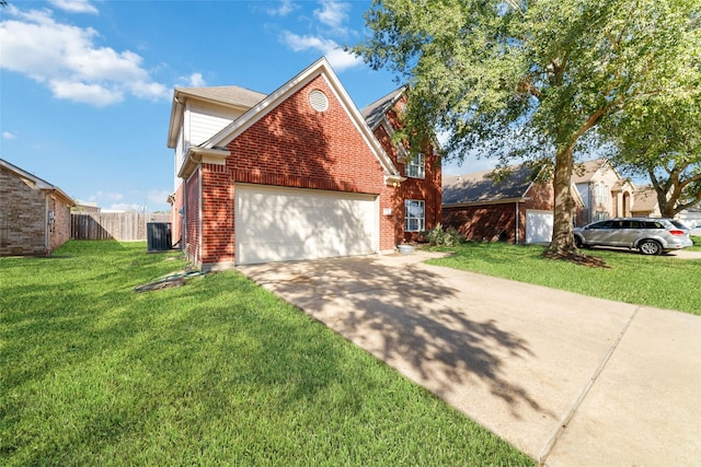 view of property with central AC, a front lawn, and a garage