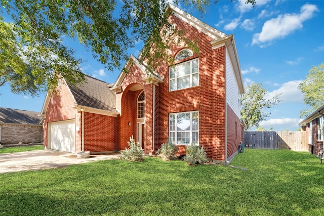 front of property with a front yard and a garage