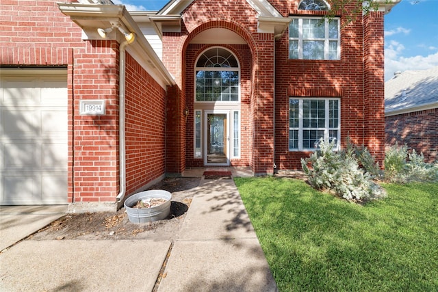 view of exterior entry featuring a garage