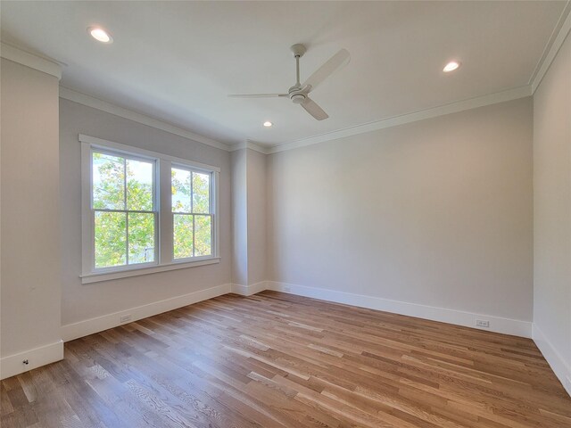 unfurnished room with ornamental molding, ceiling fan, and light hardwood / wood-style floors