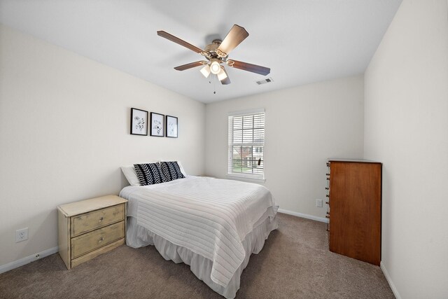 bedroom with light colored carpet and ceiling fan