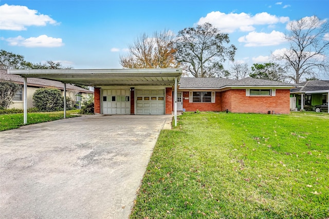 single story home with a front yard, a garage, and a carport