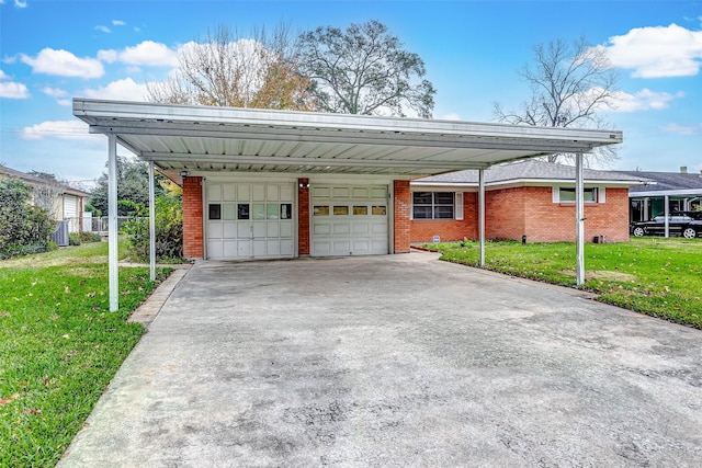 garage with a lawn and a carport