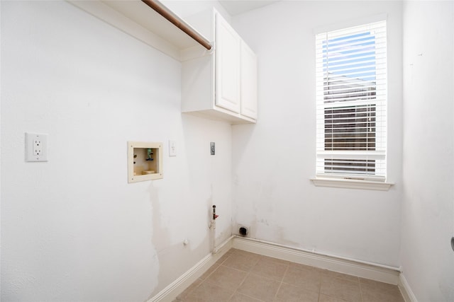 laundry room featuring washer hookup, cabinets, hookup for a gas dryer, and hookup for an electric dryer