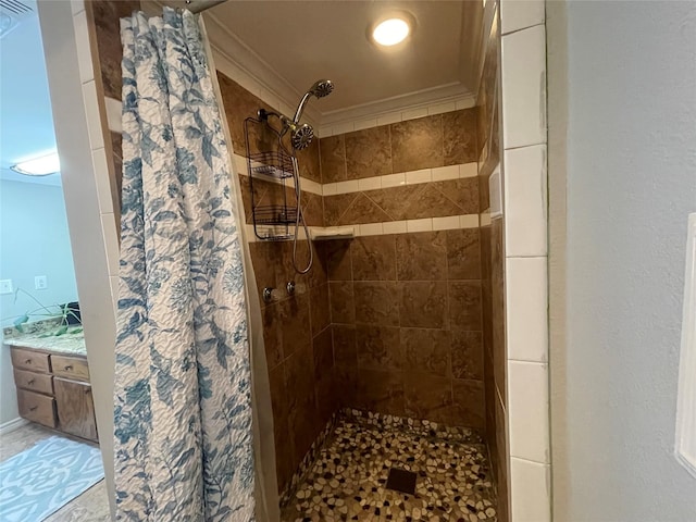 bathroom with a shower with curtain and crown molding