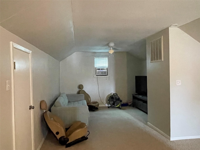 sitting room featuring carpet, ceiling fan, cooling unit, and vaulted ceiling