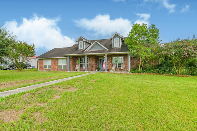 view of front facade featuring a front yard and a porch