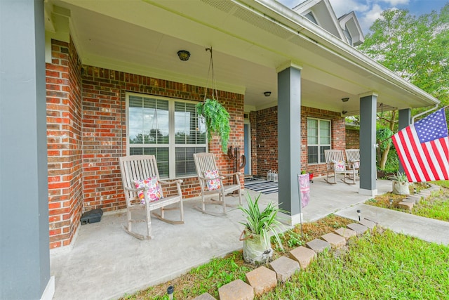 view of patio featuring a porch