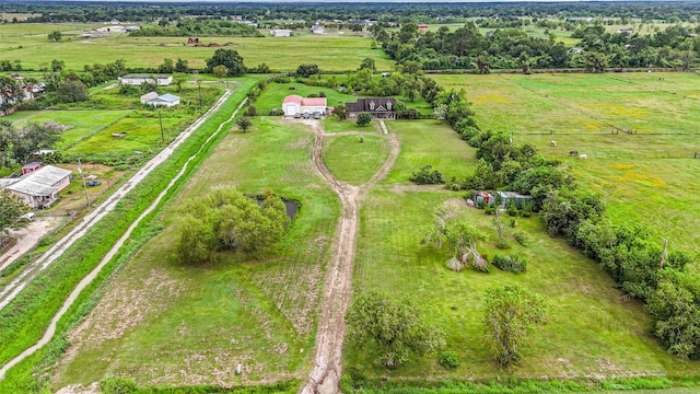 birds eye view of property featuring a rural view