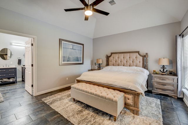 bedroom with ceiling fan, sink, lofted ceiling, and dark wood-type flooring