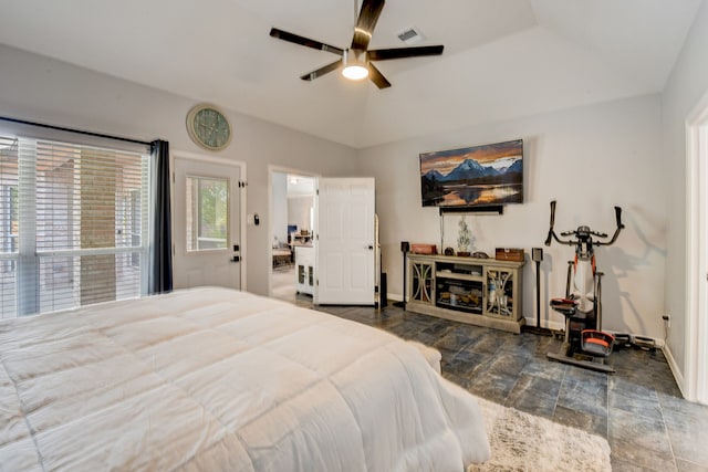 bedroom with ceiling fan and lofted ceiling