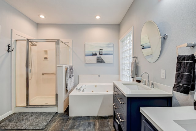 bathroom with separate shower and tub, hardwood / wood-style floors, and vanity