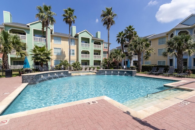 view of pool featuring pool water feature