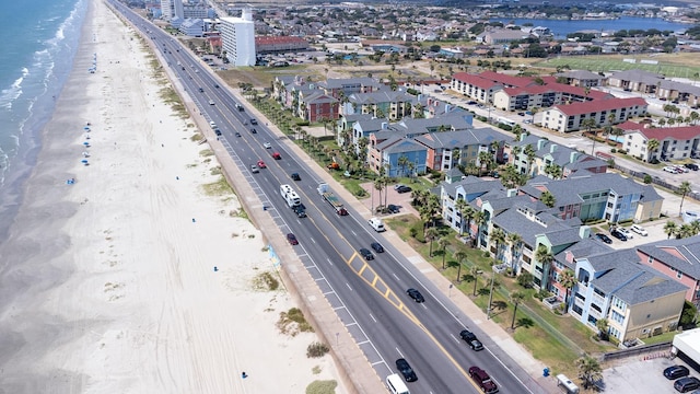 aerial view featuring a view of the beach and a water view