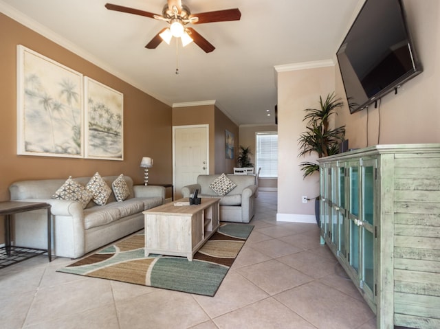 living room with ceiling fan, light tile patterned floors, and ornamental molding