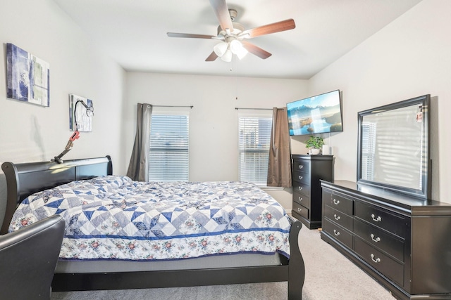 bedroom featuring ceiling fan and carpet floors